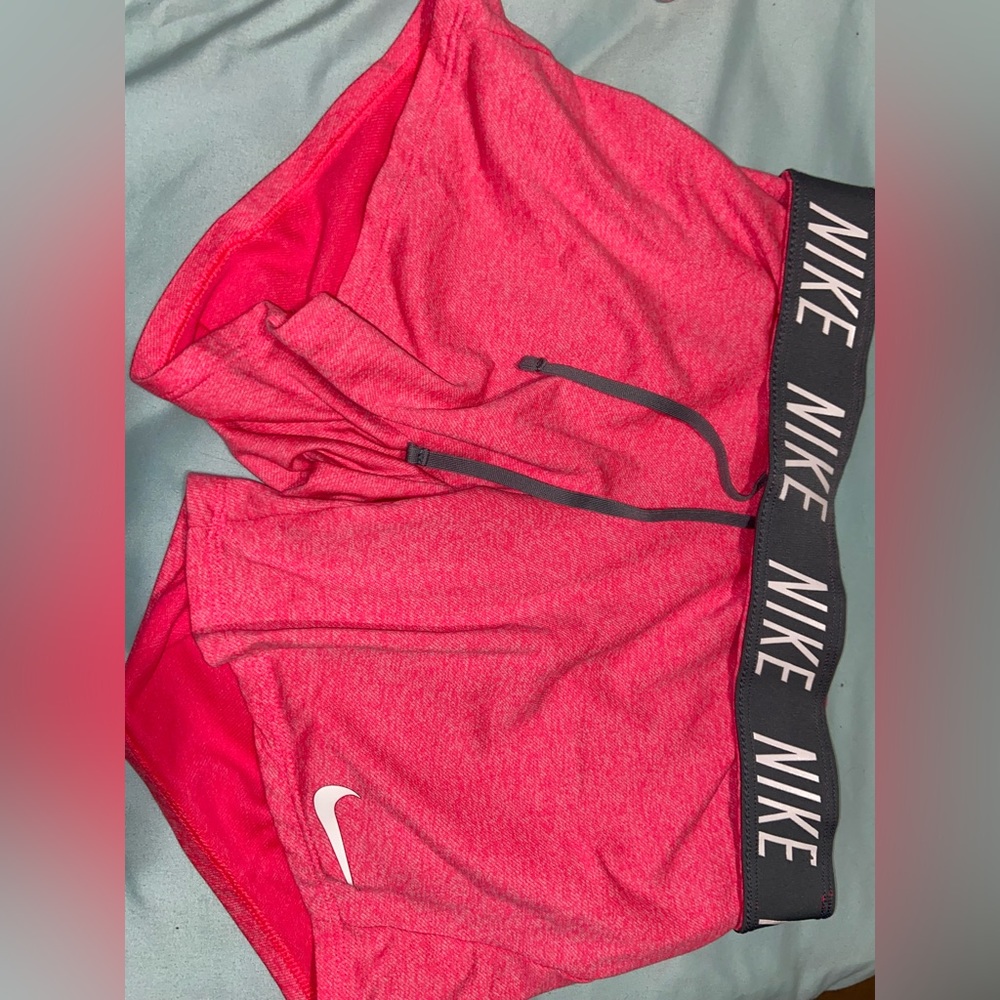 Pink Nike shorts